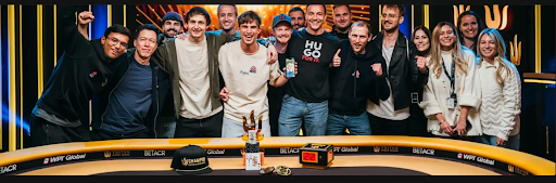 Mario Mosbock and a group of friends celebrating his massive win at the Triton Poker Series final table
