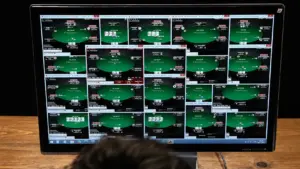 Professional poker player Randy "nanonoko" Lew mass multi-tabling 24 online poker tables on a single monitor.