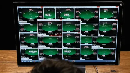 Professional poker player Randy "nanonoko" Lew mass multi-tabling 24 online poker tables on a single monitor.